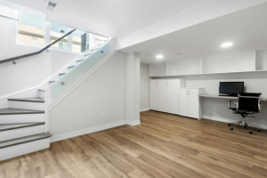 A photo of a basement with stairs leading up to the main level.